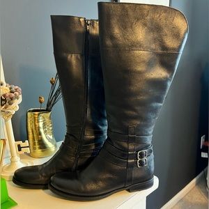 Wide Calve Black Boots. 16 inch shaft. 15 inch zipper. 1 inch heel.